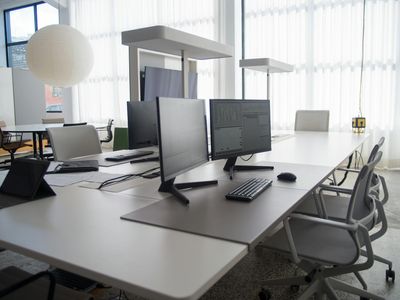 Modern office workspace with ergonomic setup